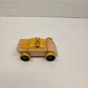 The Automoblox Mini Wooden Car in Yellow C9 is an authentic vintage toy vehicle